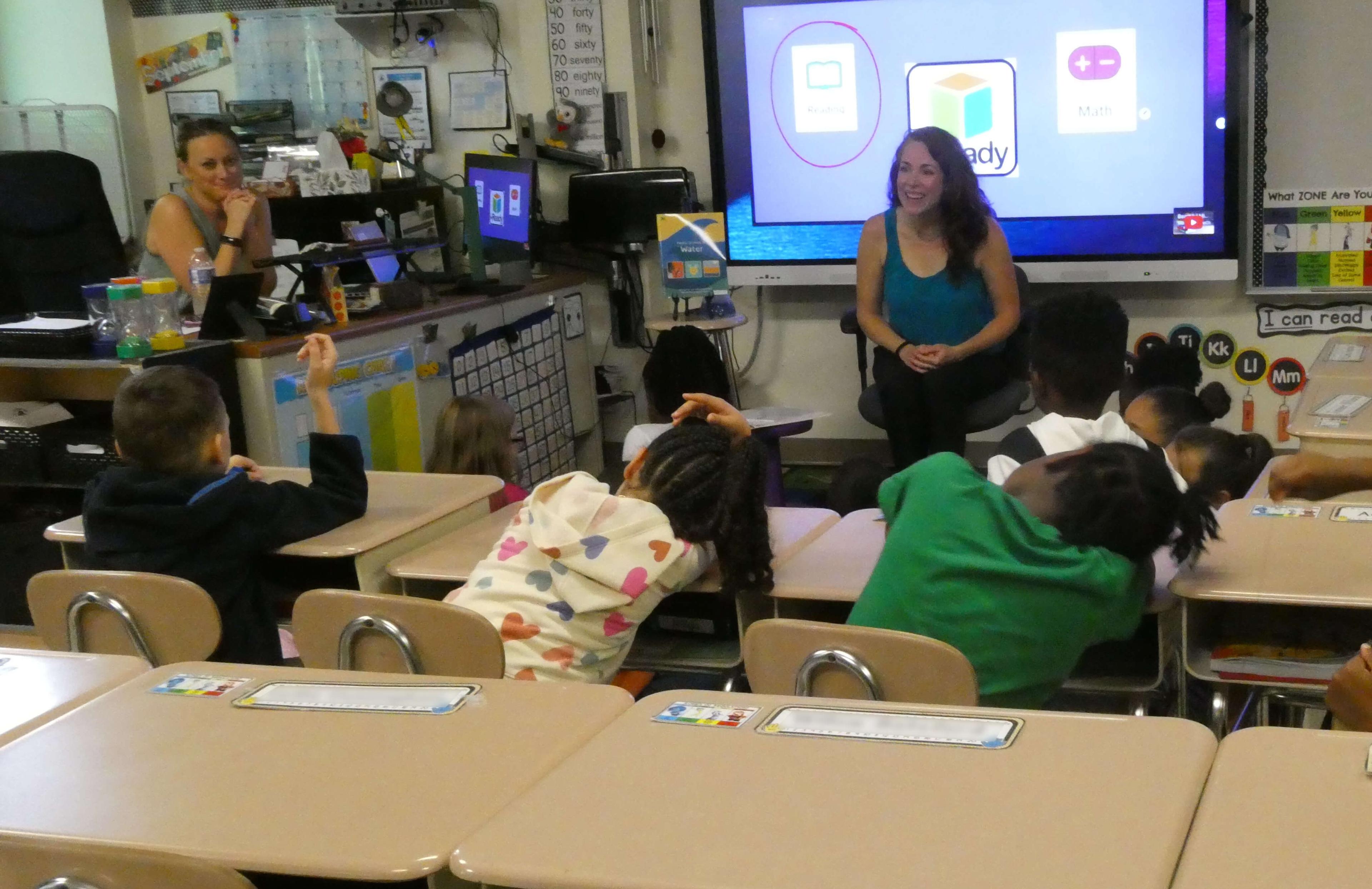 Author presenting to a class in a classroom